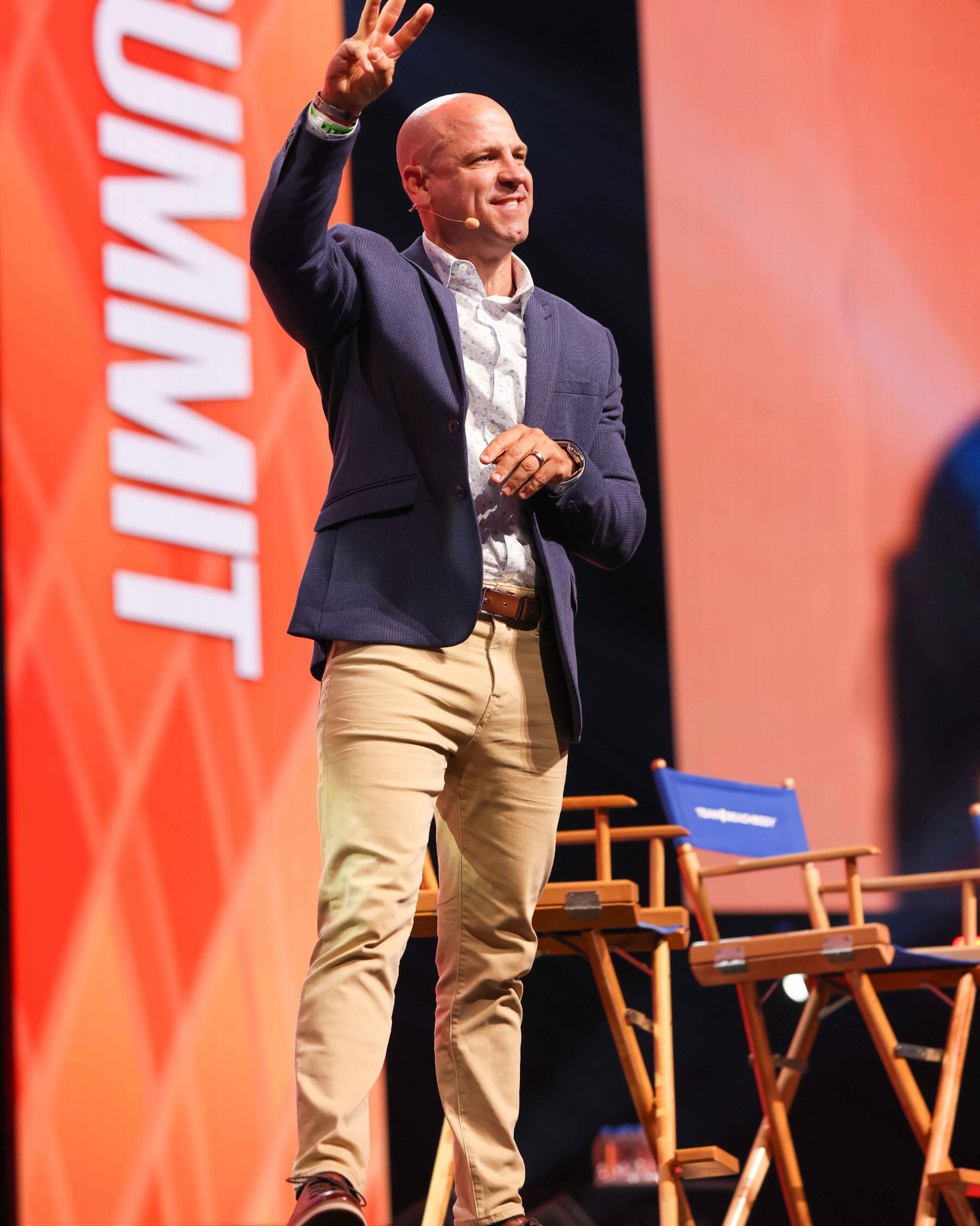 David Atkins on stage at a national leadership summit, keynote speaker on resilience and decision making