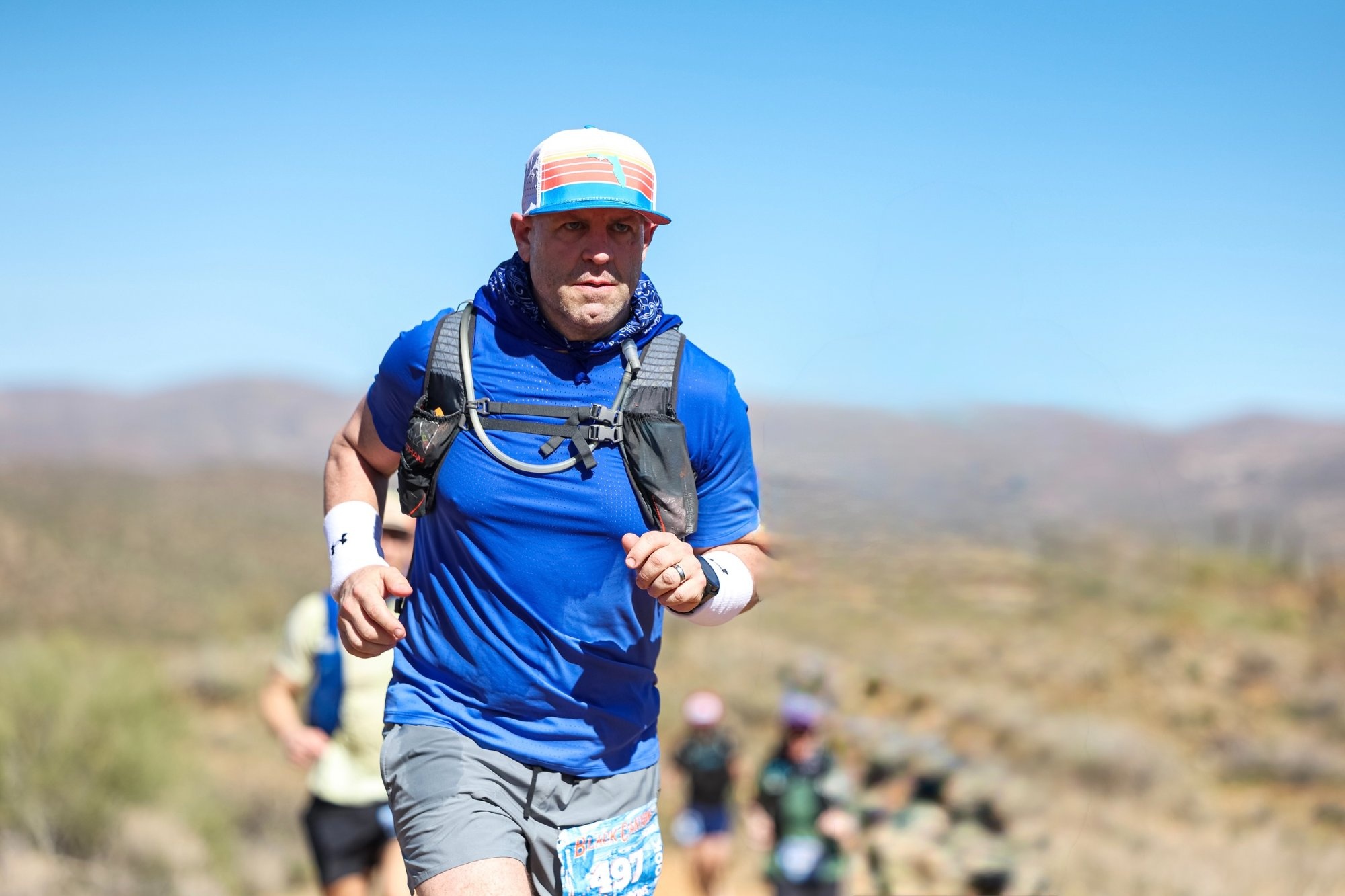 David Atkins running the Black Canyon 100K ultramarathon in Arizona, proving the One Decision Away framework